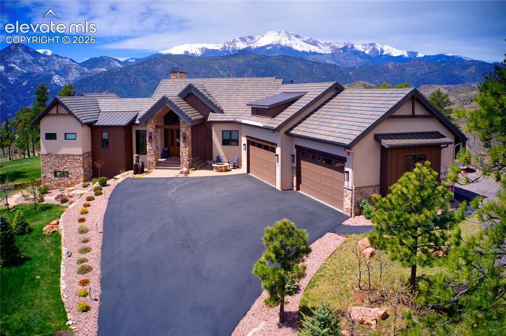 Image 1 of 50: The kind of curb appeal that makes you slow down. Aerial front exterior fra