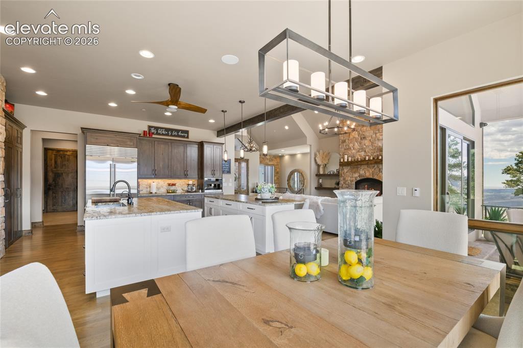 Image 19 of 50: Open-concept great room layout flowing from chef