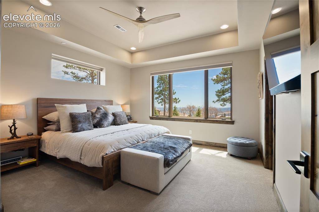 Image 41 of 50: Guests get the VIP treatment in this private lower-level suite, featuring a