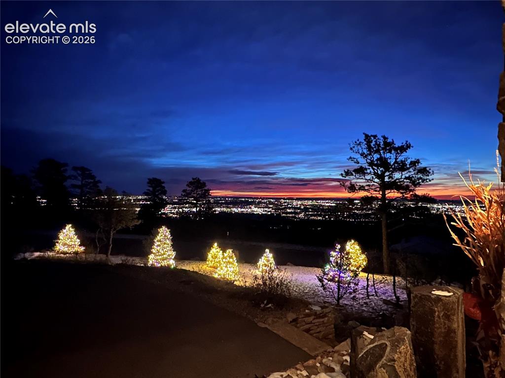 Image 48 of 50: Winter evenings, city lights & a sky that puts on a show. Holidays at 7,645