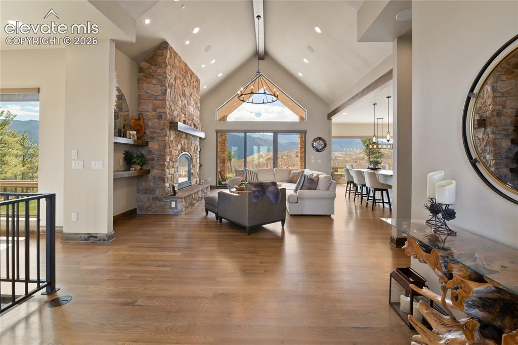 Image 5 of 50: The view that stops conversations. Open-concept great room featuring soarin