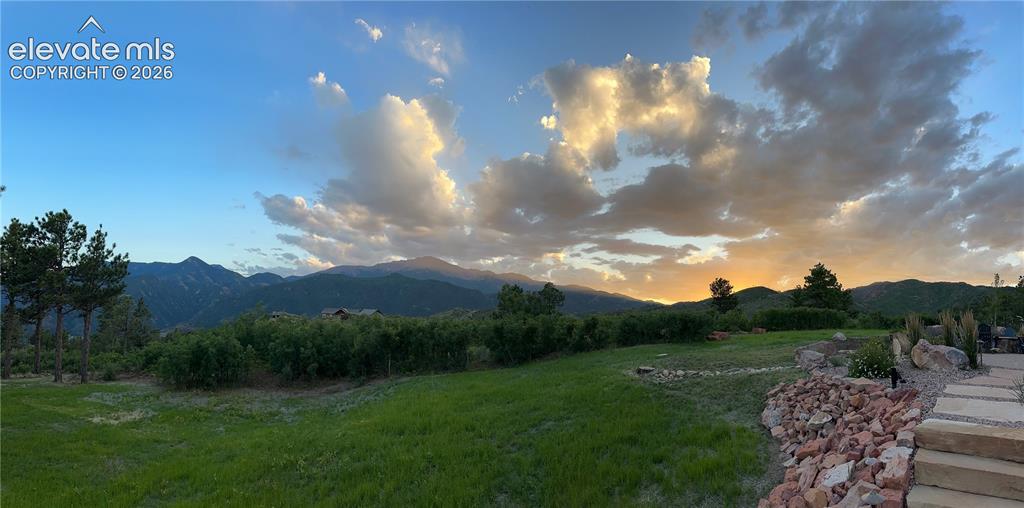 Image 50 of 50: Summer on the back lawn. Mountains, meadow & room to breathe.