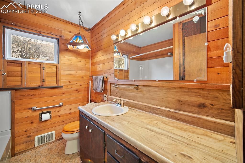 Image 16 of 48: Main level bathroom. 