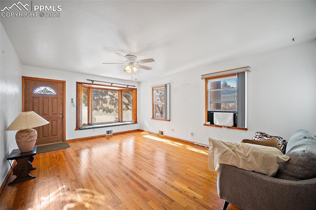 Image 9 of 48: Beatiful wood floors!  Has been covered with carpet!   