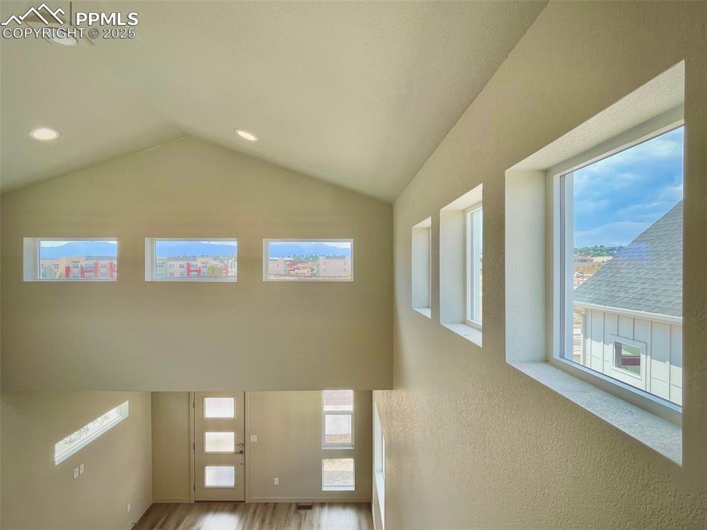 Image 21 of 24: Windows galore make this home light and bright.