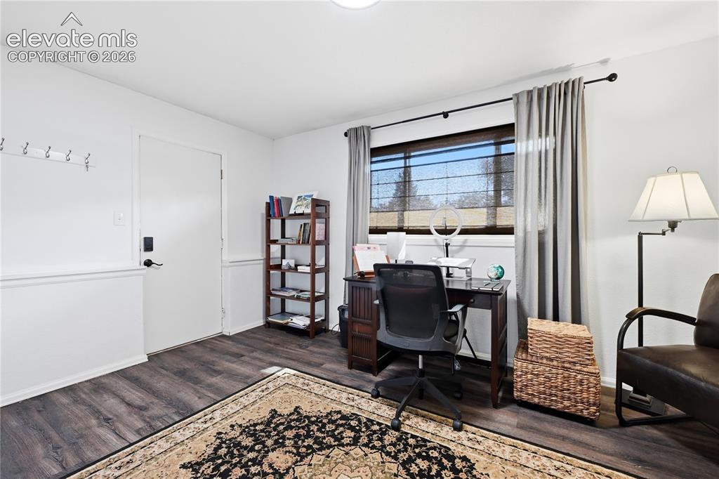 Image 19 of 44: View of private front entrance to the lower level bedroom making this poten
