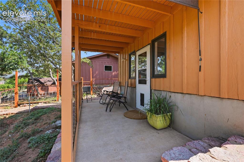 Image 22 of 44: Lower walk out patio off of lower level of home