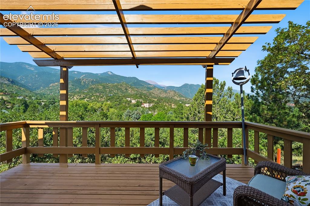 Image 30 of 44: Upper Level deck with the VIEWS! imagine morning coffee or evening wine rel