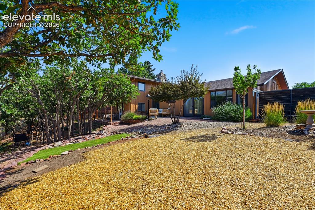 Image 38 of 44: Tons of space in the back yard for entertaining and room to breath and spre