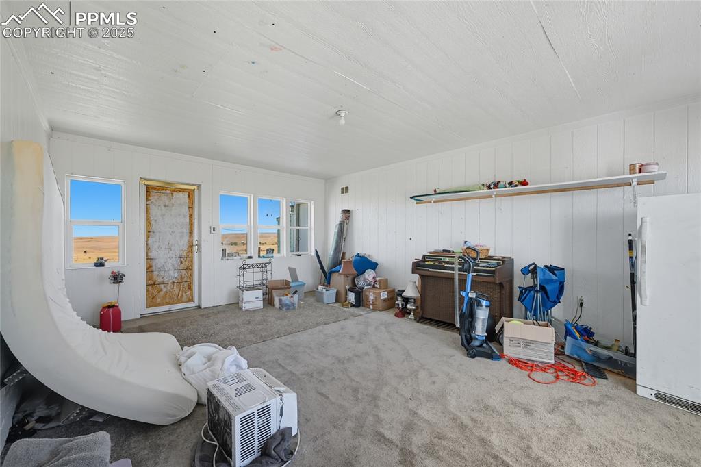 Image 8 of 28: View of carpeted living area