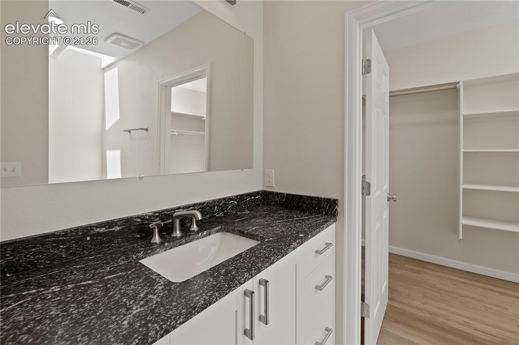 Image 36 of 49: Bathroom with Walk-in Closet