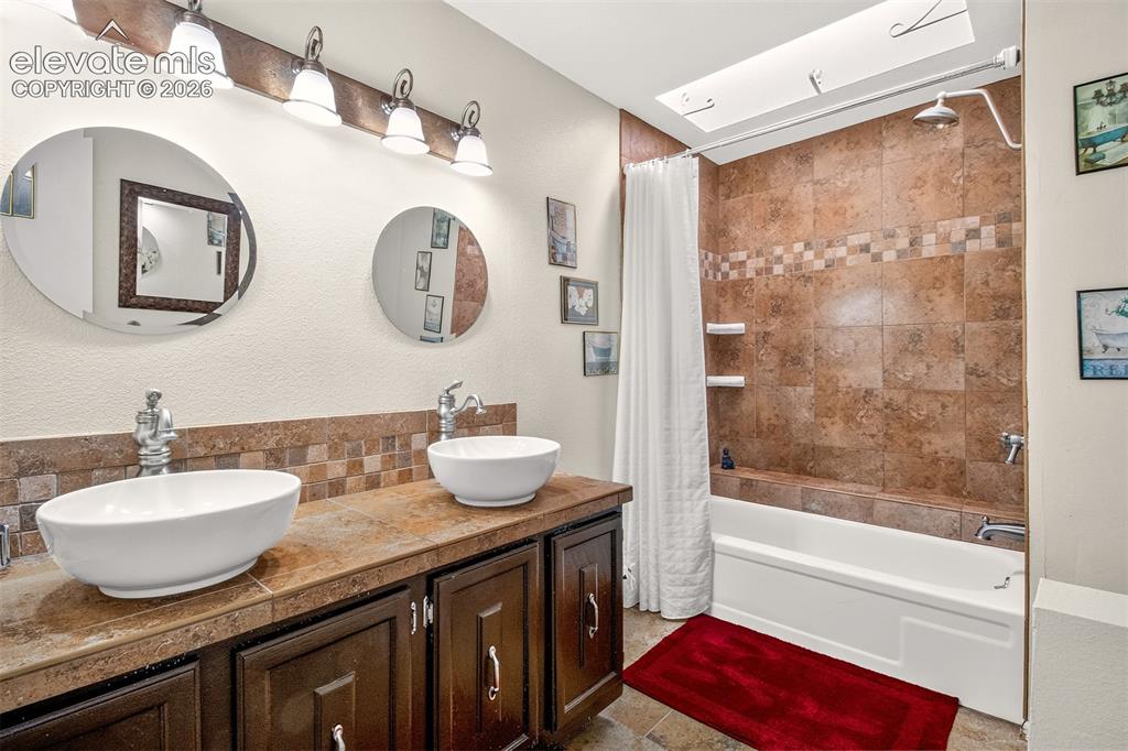 Image 14 of 27: Primary Bath with dual sinks