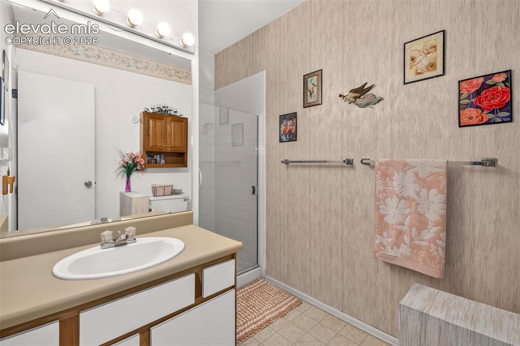 Image 16 of 27: Secondary Bath for Second Bedroom