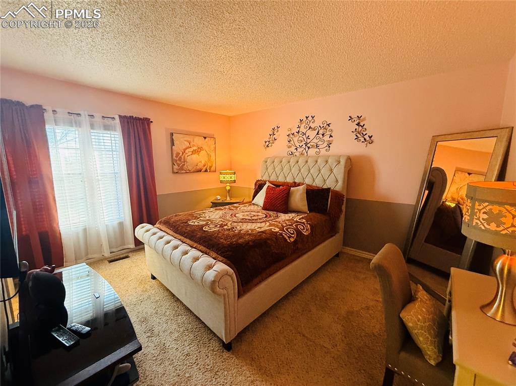 Image 20 of 28: Bedroom