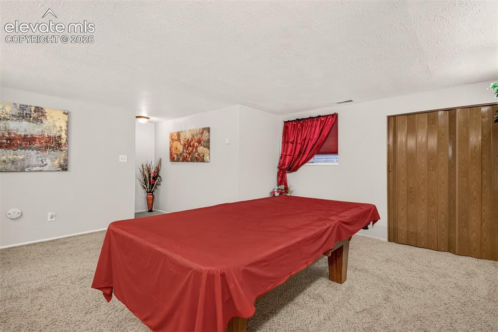 Image 21 of 27: Bedroom