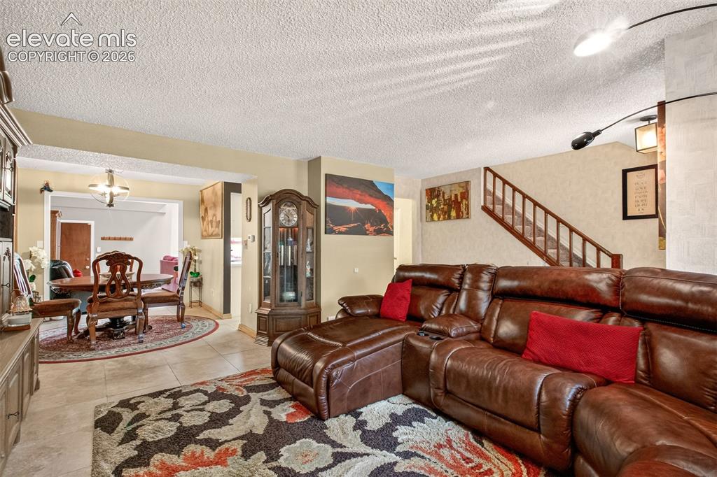 Image 3 of 27: Open Living Room with Eat in Dining Area