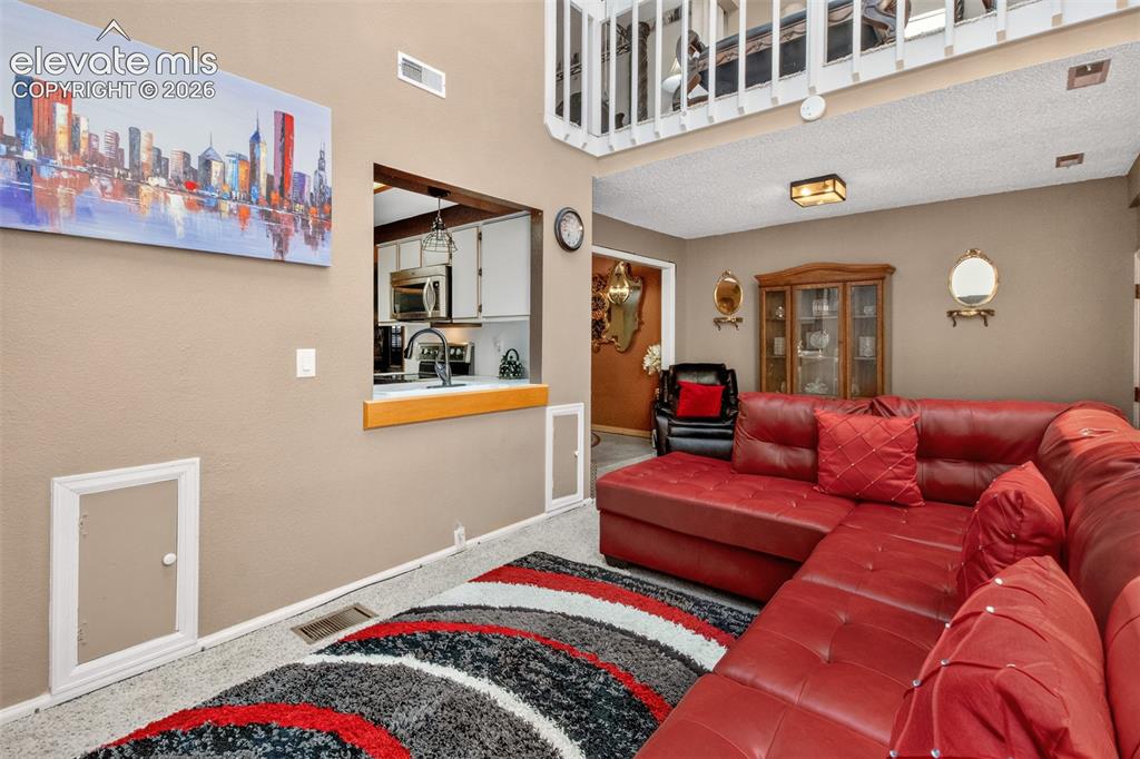 Image 9 of 27: Family Room with Natural Lighting