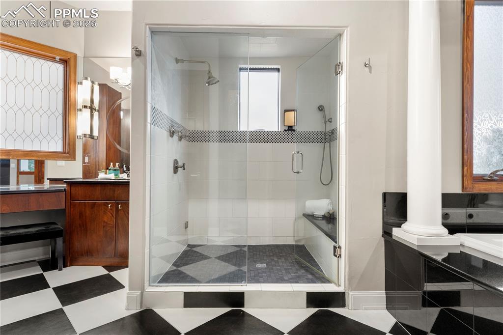 Image 27 of 46: Primary bath with steam shower