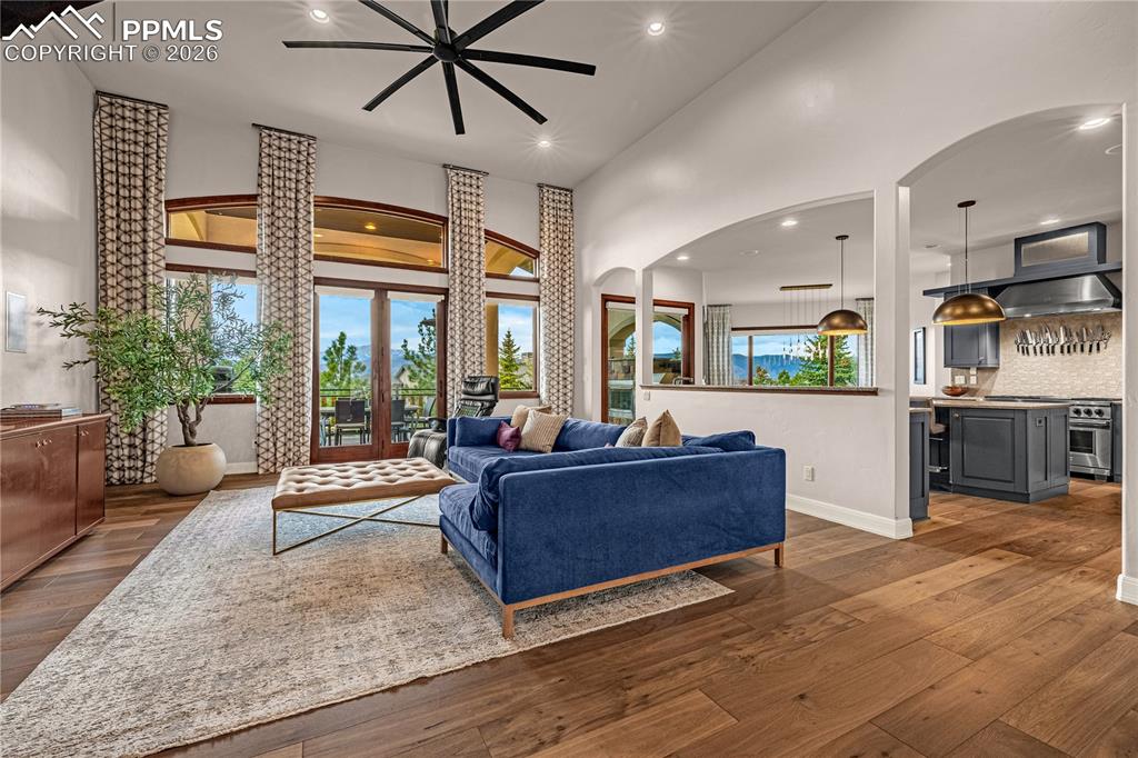 Image 3 of 46: Living room with stunning views of Pikes Peak