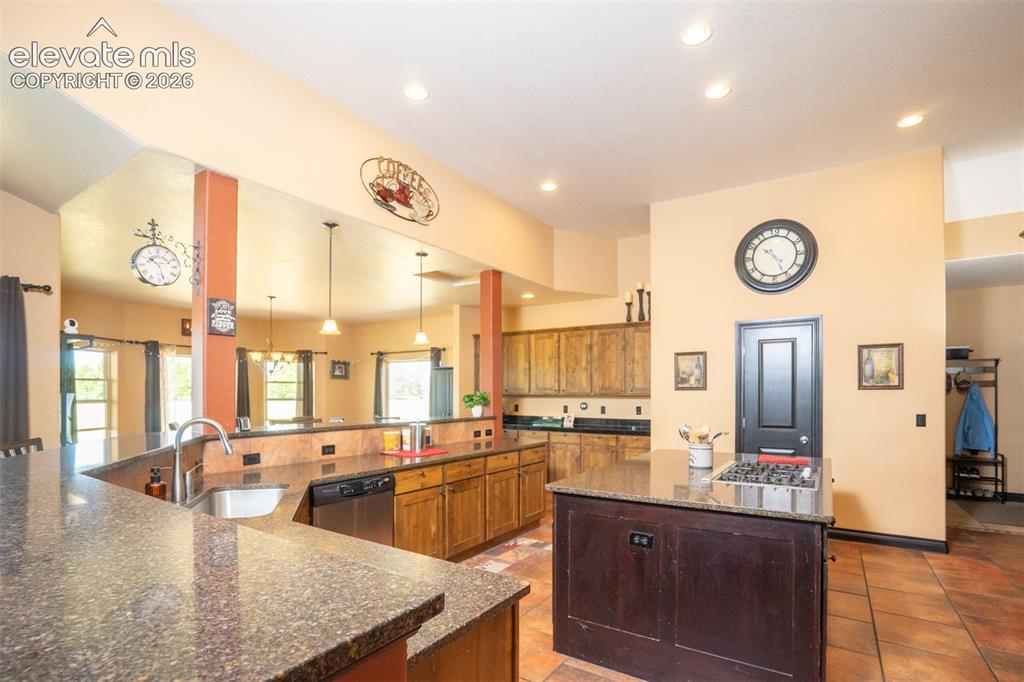 Image 12 of 47: Views from the kitchen through the dining room