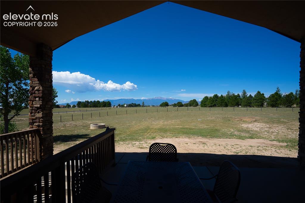 Image 2 of 47: Soak in the spectacular Pikes Peak views from your backyard patio or around