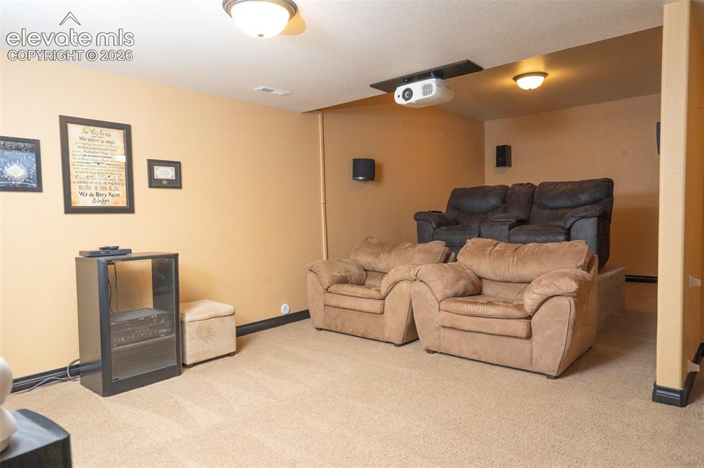Image 31 of 47: An elevated area to raise up chairs for easy viewing (equipment doesn