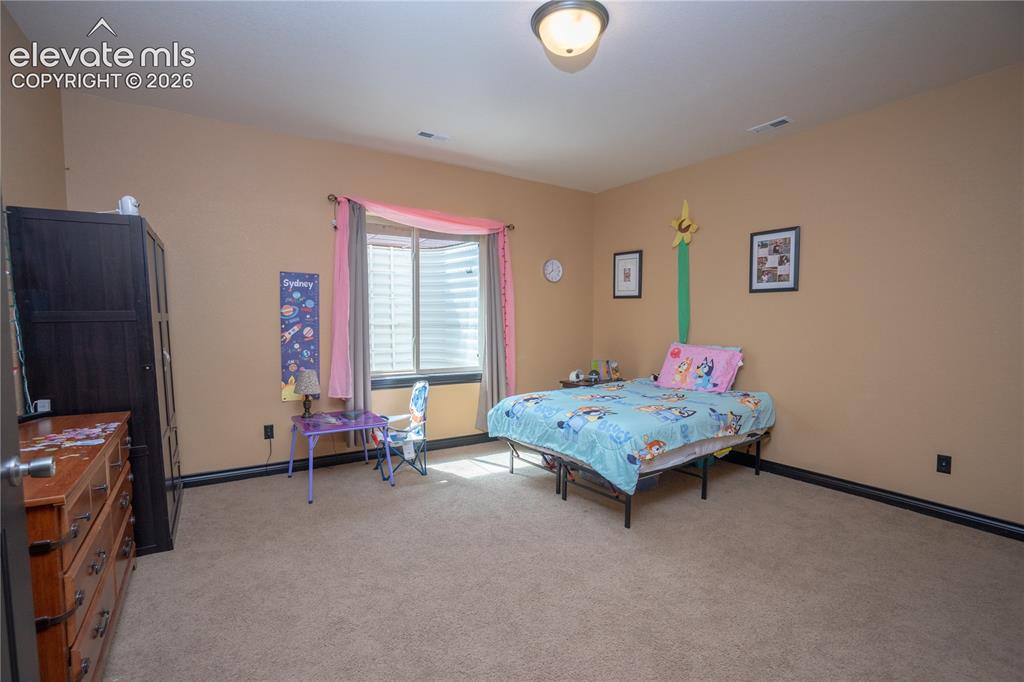 Image 36 of 47: The 6th bdrm on the basement level is 15x15 is considered non-conforming -