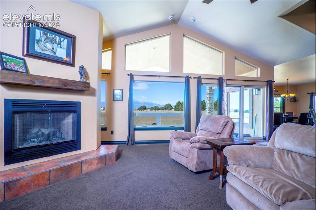 Image 6 of 47: As you open the door your greated with the most beautiful Pikes Peak view!
