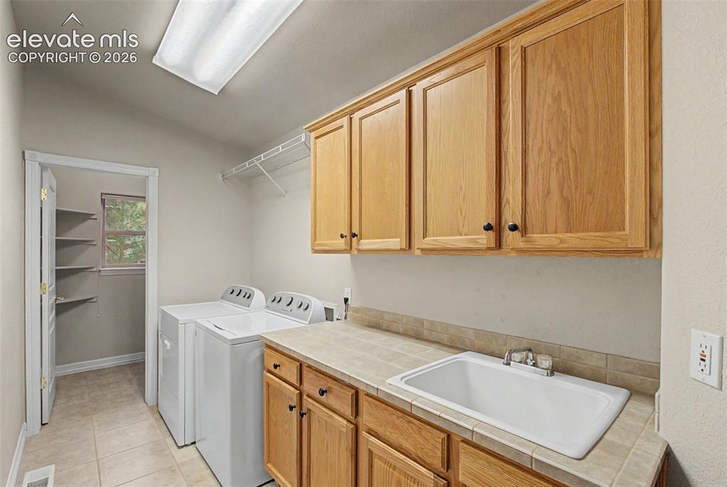 Image 18 of 46: Main Level Laundry Room