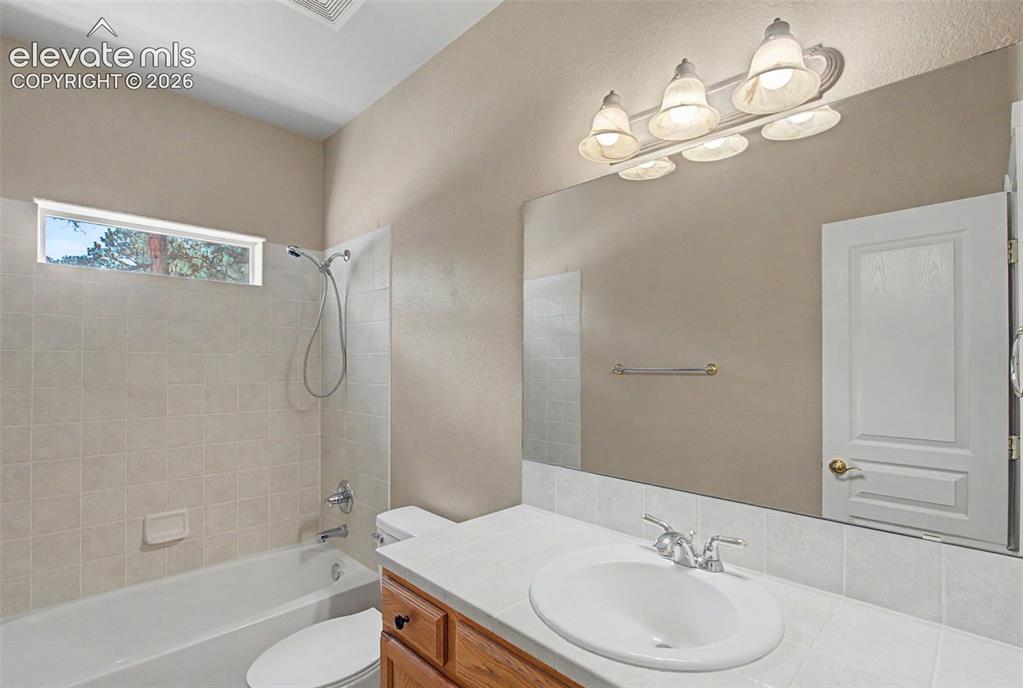 Image 7 of 46: Main level full bathroom