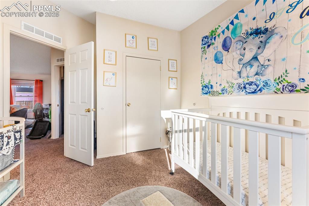 Image 22 of 35: Bedroom