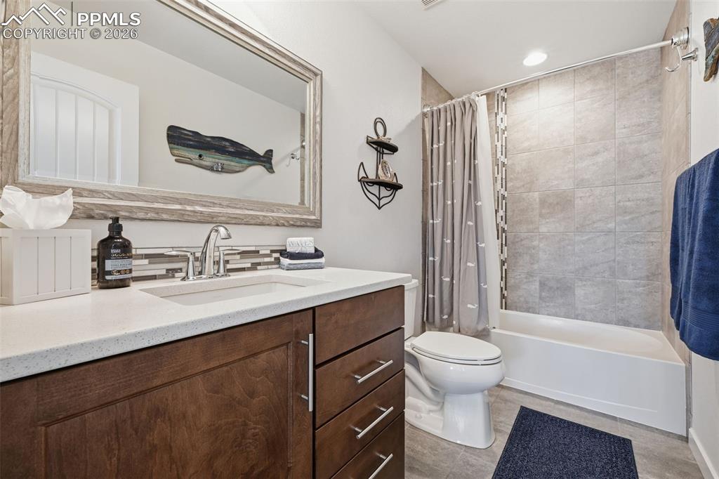 Image 35 of 50: Upper Full Bath