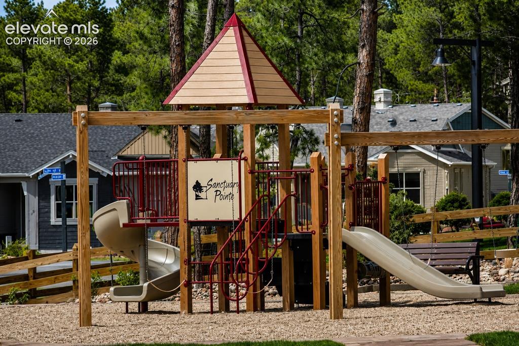 Image 49 of 50: Second Neighborhood playground, walking paths, and gathering spaces for yea