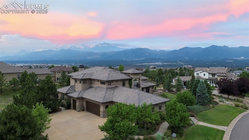 Image 2 of 50: Front of Home with Mountain Views