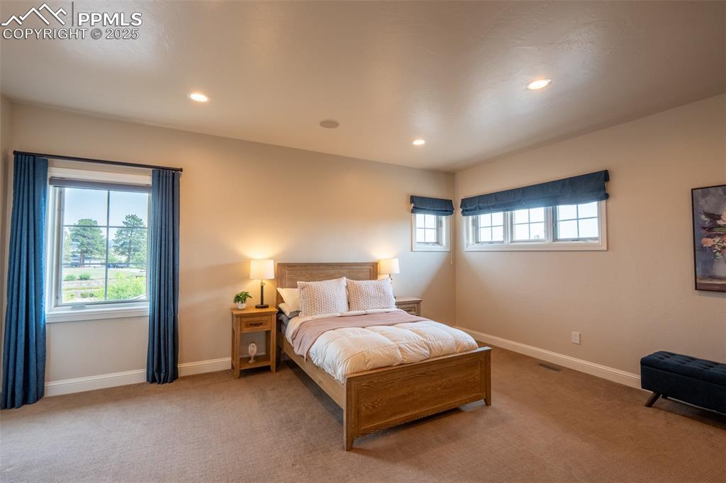 Image 28 of 50: Upstairs Bedroom.