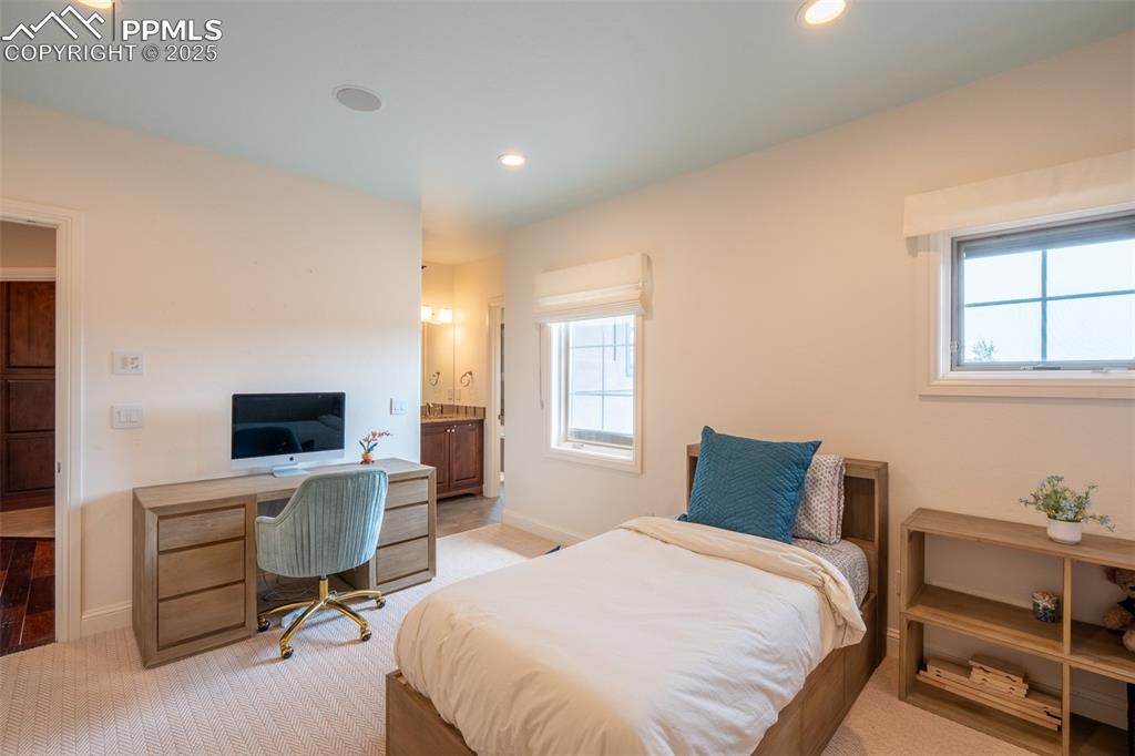 Image 33 of 50: Upstairs Bedroom with Attached Bath