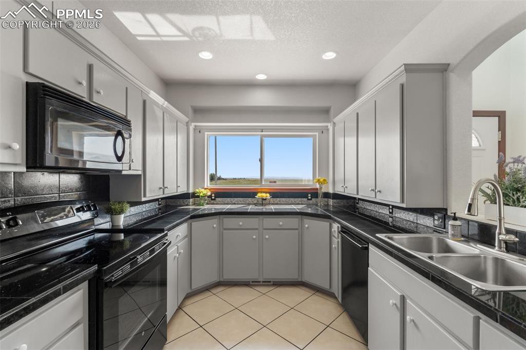 Image 10 of 33: Cabinets on all sides