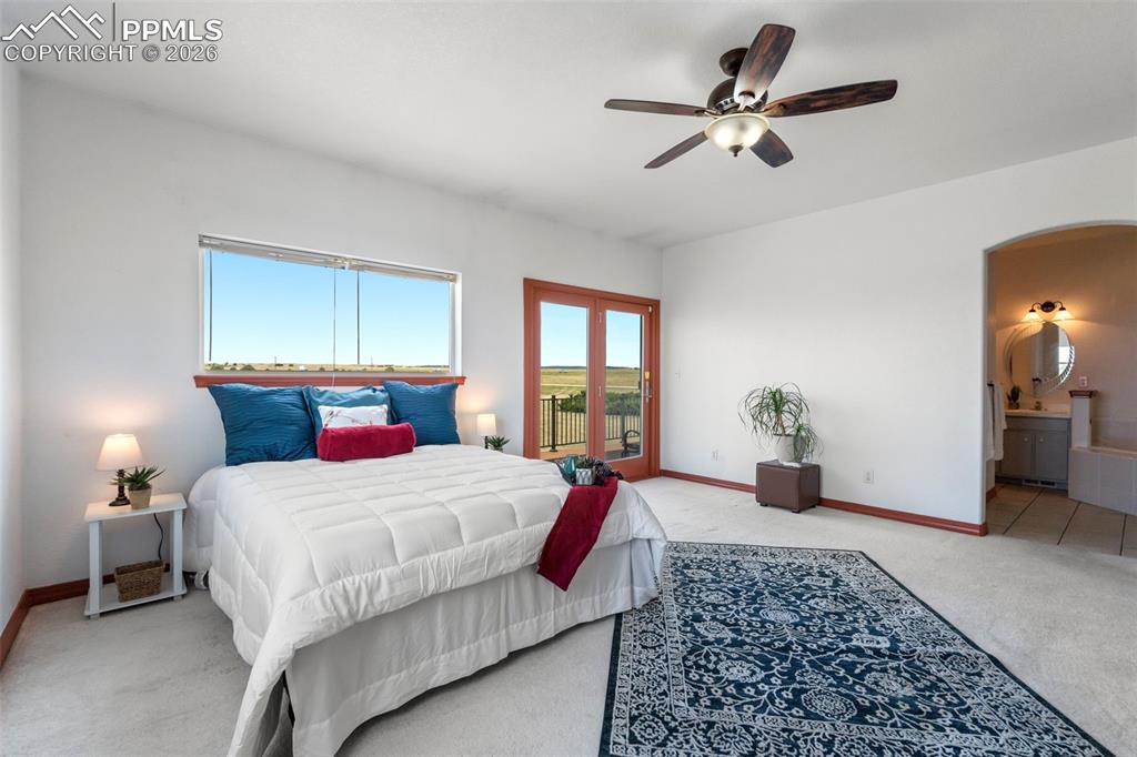 Image 14 of 33: Walk out to expansive deck