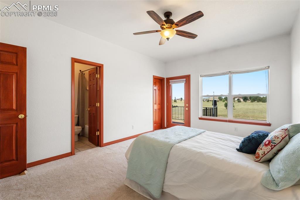 Image 19 of 33: Another main level bedroom for office or work room