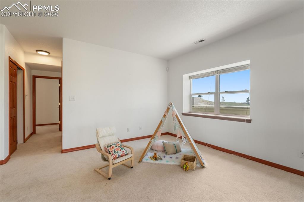 Image 21 of 33: Play area/living space with... more windows and more light!