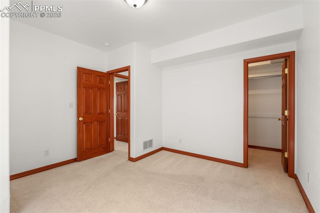 Image 25 of 33: 2 additional bedrooms in lower level 