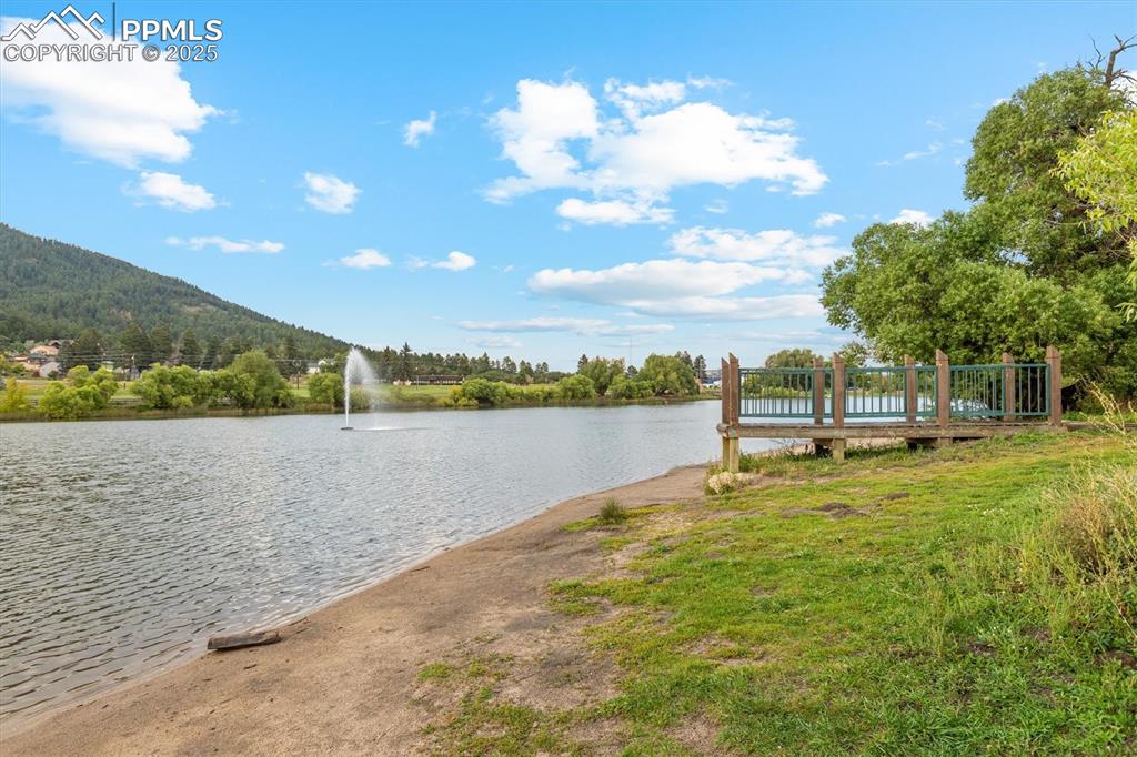 Image 19 of 22: Water view with a mountainous background