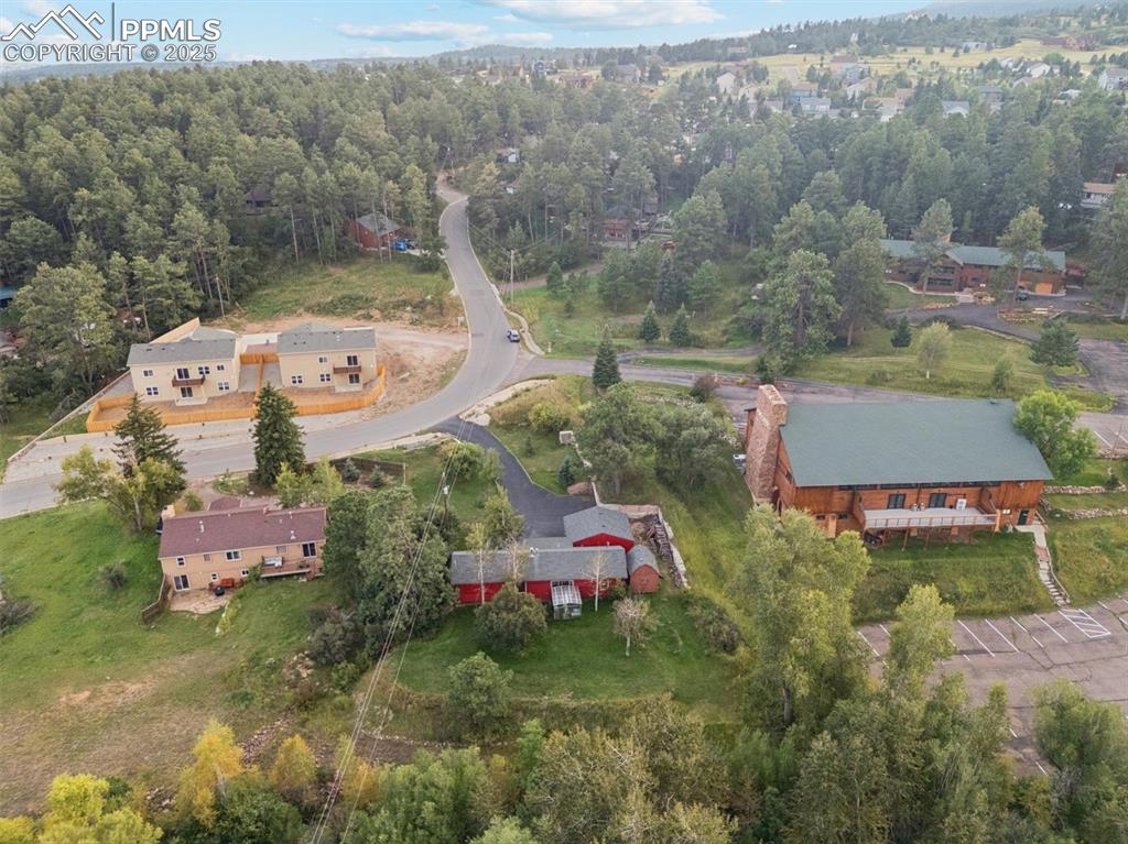 Image 20 of 22: Aerial view of property and surrounding area