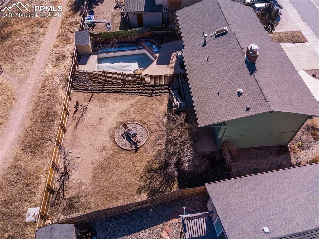 Image 39 of 48: Aerial view of property and surrounding area