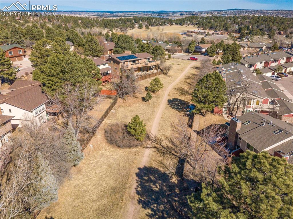 Image 42 of 48: View of property location with nearby suburban area