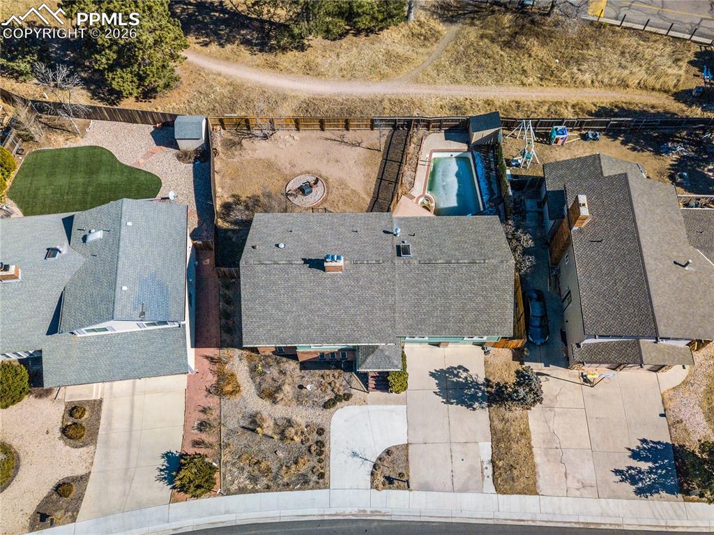 Image 44 of 48: View of property location with a pool