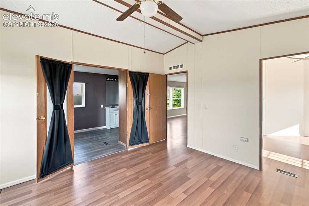 Image 25 of 50: Master Bedroom