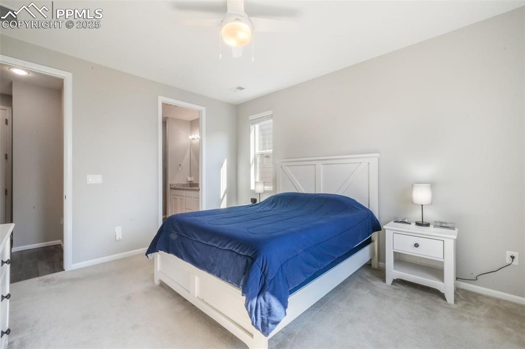 Image 25 of 47: Primary bedroom with large walk in closet and ensuite bathroom