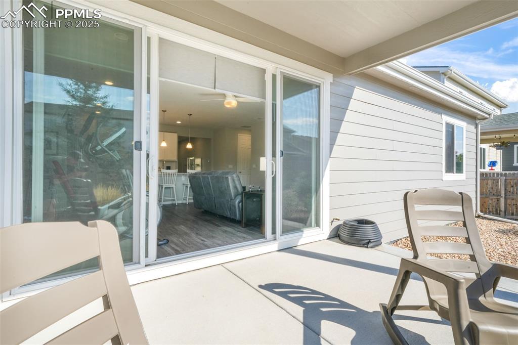 Image 33 of 47: Large covered patio with gas line