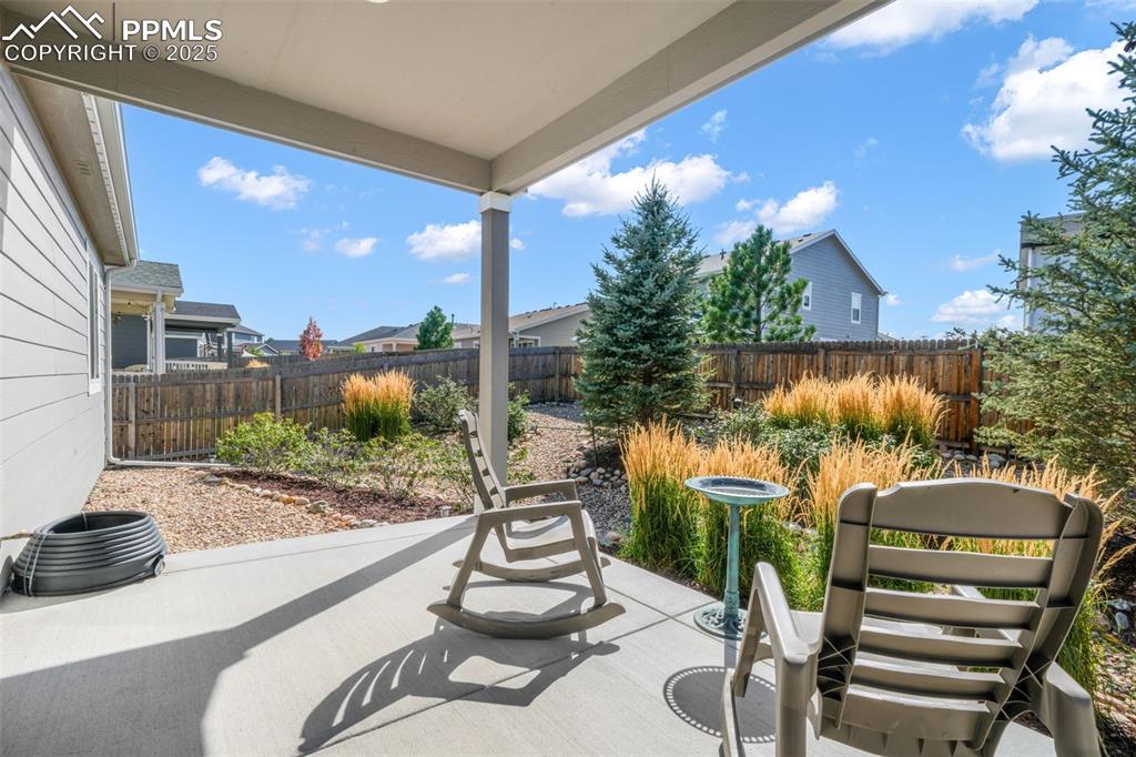 Image 34 of 47: Large covered patio with gas line